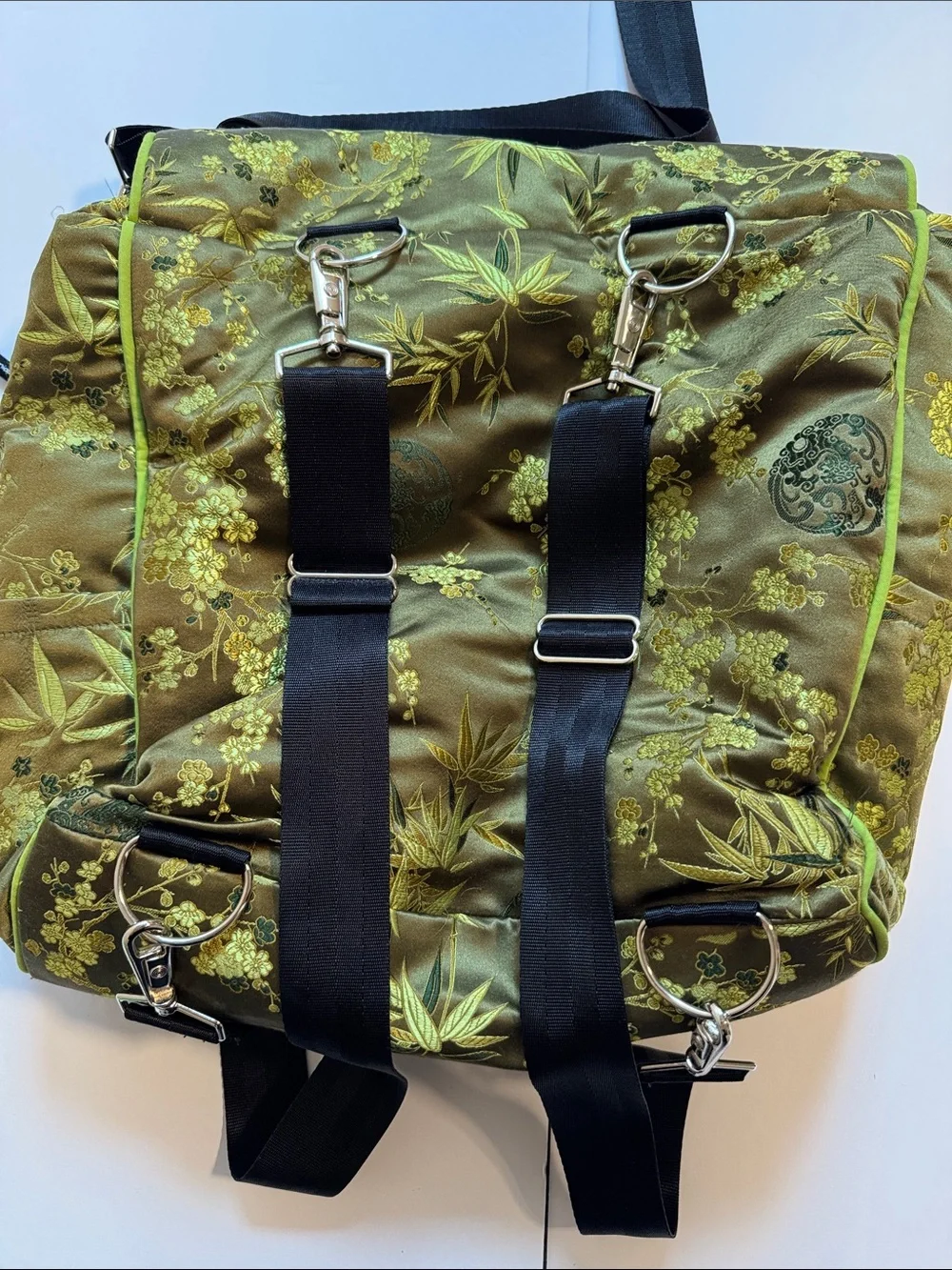 Petunia Pickle Bottom olive and lime floral crossbody diaperbag
